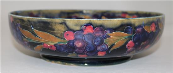 A Moorcroft pomegranate fruit bowl, c.1918, 26.5cm